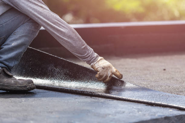 Professional Emergency Waterproofing technician working in Bloomington, IN